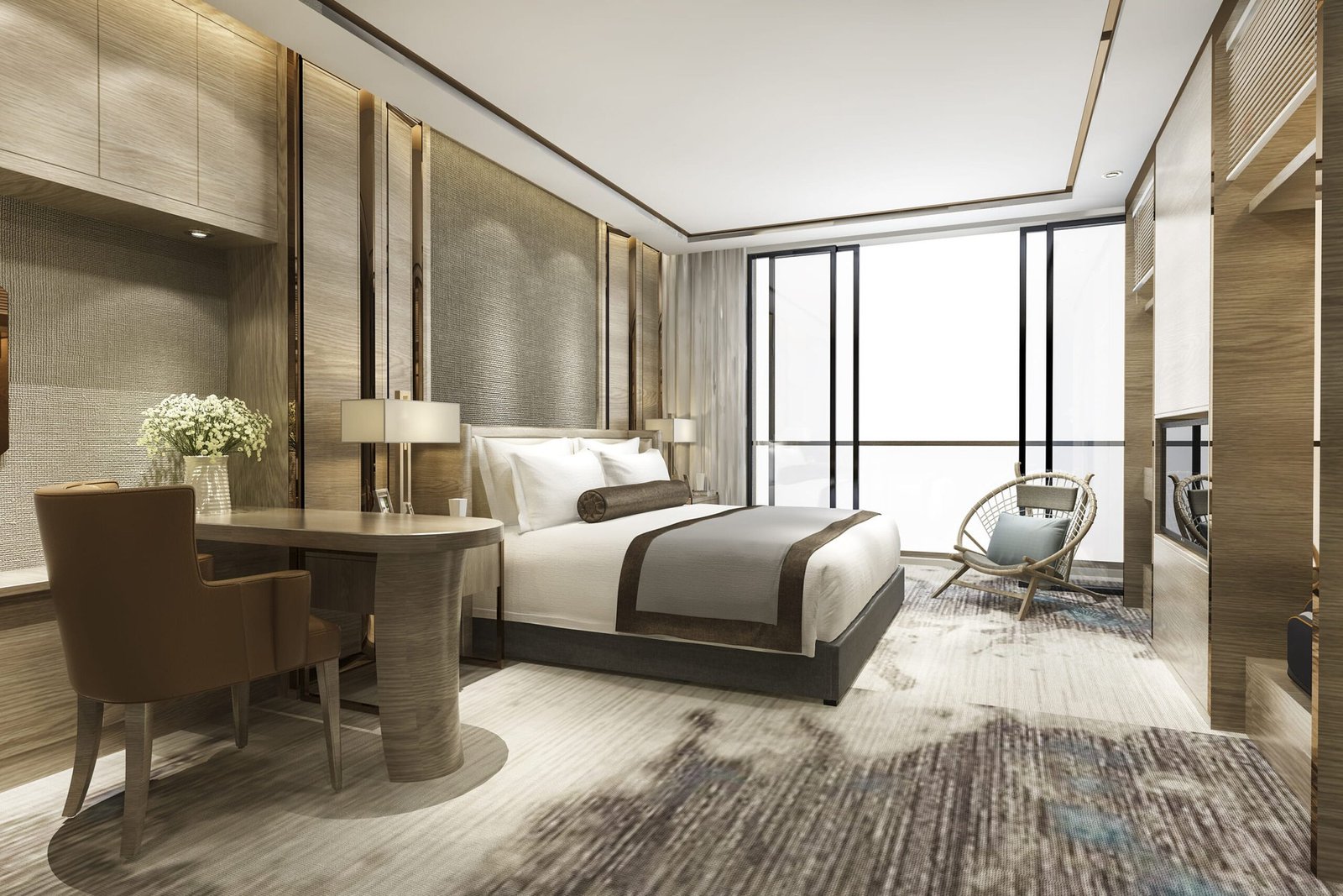 Suite de hotel con cama doble, cabecero y luz natural, fotografiada con criterio de interiorismo